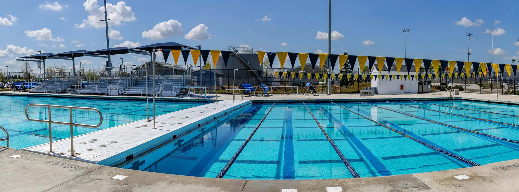 Fans posing with the mascot